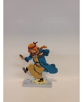 Tintin marche sur un pétard
